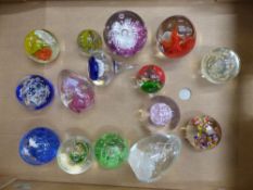 A collection of art glass paperweights (15).