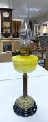 A 19th Century Brass Duplex Burner Oil Lamp on Earthenware Base. Fluted Brass Column with Yellow