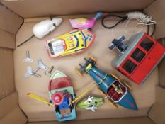 A collection of vintage and more modern Tin plate clockwork toys