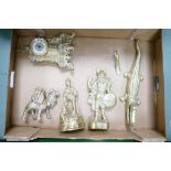 A collection of brass ware to include decorative mantle clock, ornaments, nut cracker etc
