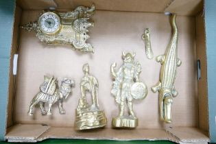 A collection of brass ware to include decorative mantle clock, ornaments, nut cracker etc