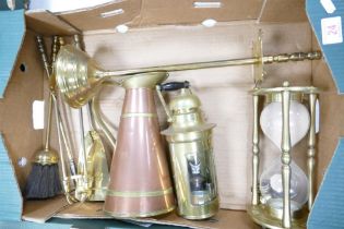 A collection of brass ware to include fireside set, sandglass timer, gas lamp etc