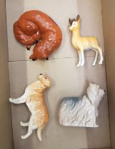 A group of Beswick Animal figures to include curled fox, Yorkshire terrier, golden retriever &