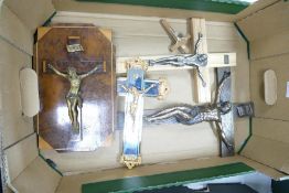 A collection of large Resin & Metal Crucifixes