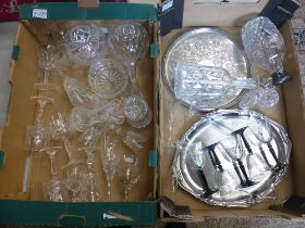 A mixed collection of crystal cut drinking glasses to include wine glasses, crystal decanters,