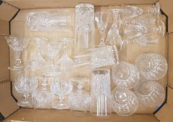 A collection of cut glass glasses, 4 sets of 4 and 1 set of 6 (1 tray).