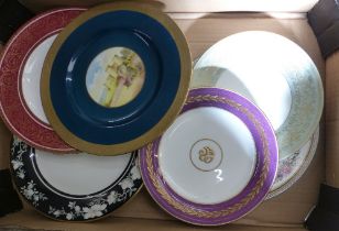 A collection of decorative wall plates including 2 1930's Wedgwood examples, one signed A Holland (1