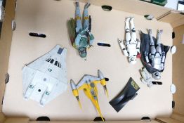 A collection of Heavy Disney Starwars figures & similar spacecraft