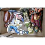 A mixed collection of items to include large resin figures with myth & magic themes