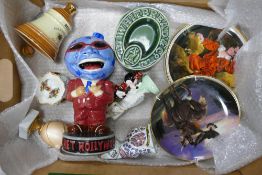 A mixed collection of items to include Planet Hollywood Figure, Whitbread Ashtrays, Disney Mini