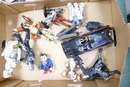 A mixed collection of collectable toys including Rocky, Batman, Superman, Starwars, Dr Who etc