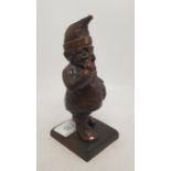 A Bronzed Inkwell in the form of an unusual Sleepy Snuff Taker in Pyjamas. Height: 16.3cm