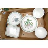 A collection of Portmeirion Botanic patterned items including bowl, storage pots, oblong serving
