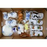 A Mixed Collection of Ceramic Items to include Royal Worcester Blue Sprays Graduated Jugs, Cow