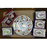A collection of Royal Crown Derby to include seasons lidded boxes, broaches and Asian Rose plates,