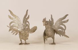 Two White Metal Fighting Cocks, likely Thai. Height: 13cm (2)