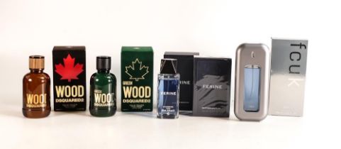 A collection of men's used aftershave and eau de toilette with varying amounts of fragrance