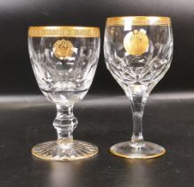 Two De Lamerie Fine Bone China heavily gilded Non Matching Wine Glasses with Star & Crescent