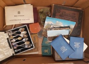A mixed collection of items to include stamp albums, commemorative coins and coin sets, collectors