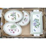 A collection of Portmeirion Botanic patterned items including oval serving platters, crescent shaped