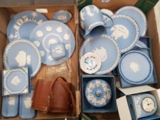 A collection of Wedgwood jasperware items to include decorative wall plates, boxed mantle clock,