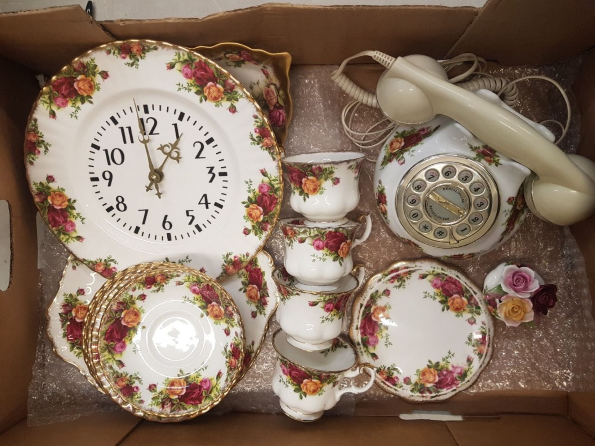 Royal Albert Old Country Roses pattern items to include a wall clock, dial-up telephone, cups and