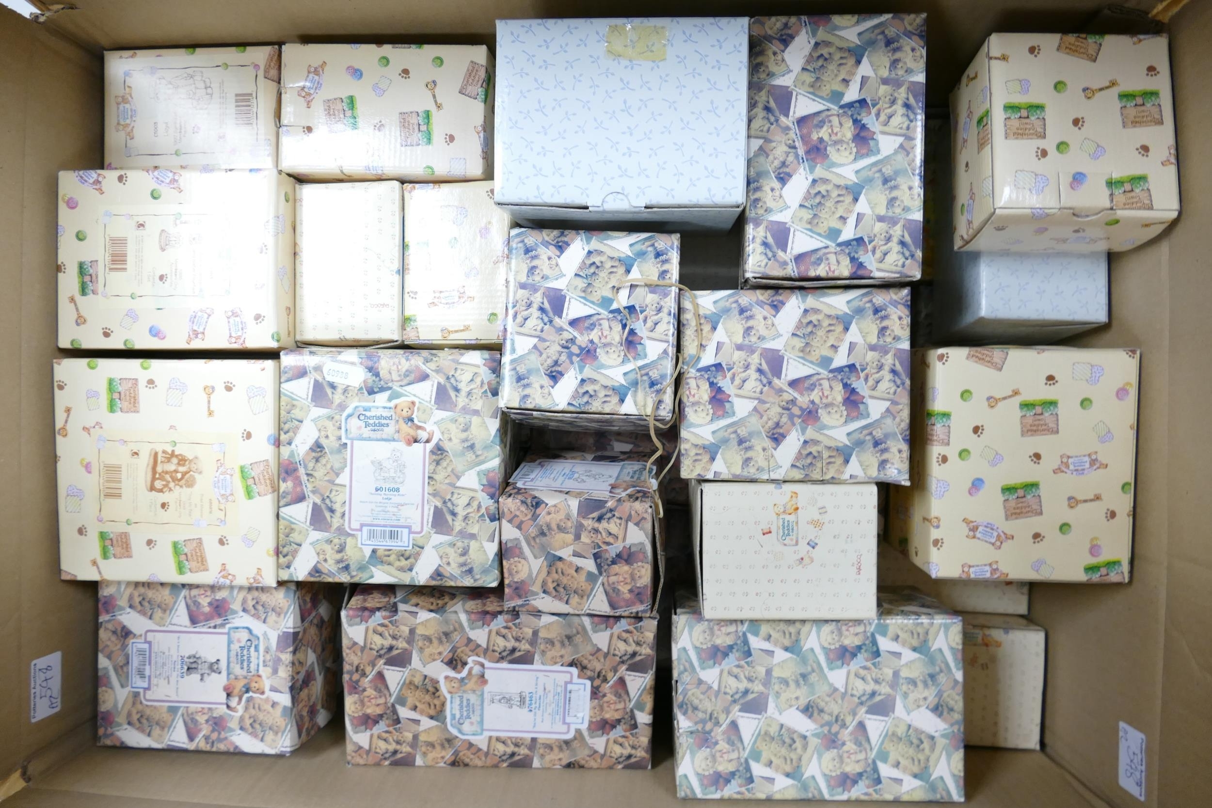 A Large Quantity of Boxed Cherished Teddies Resin Bears.