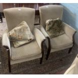Matching ladies and gents green upholstered armchairs (2).
