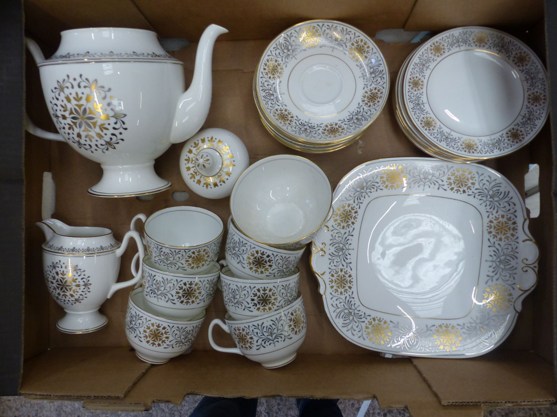 A Coalport Spanish Lace Pattern 22-Piece Teaset to include Six Trios, Teapot, Open Sugar Bowl,