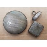 Sterling Silver ladies compact together with a Sterling Silver Vesta case, total weight 64g (2).