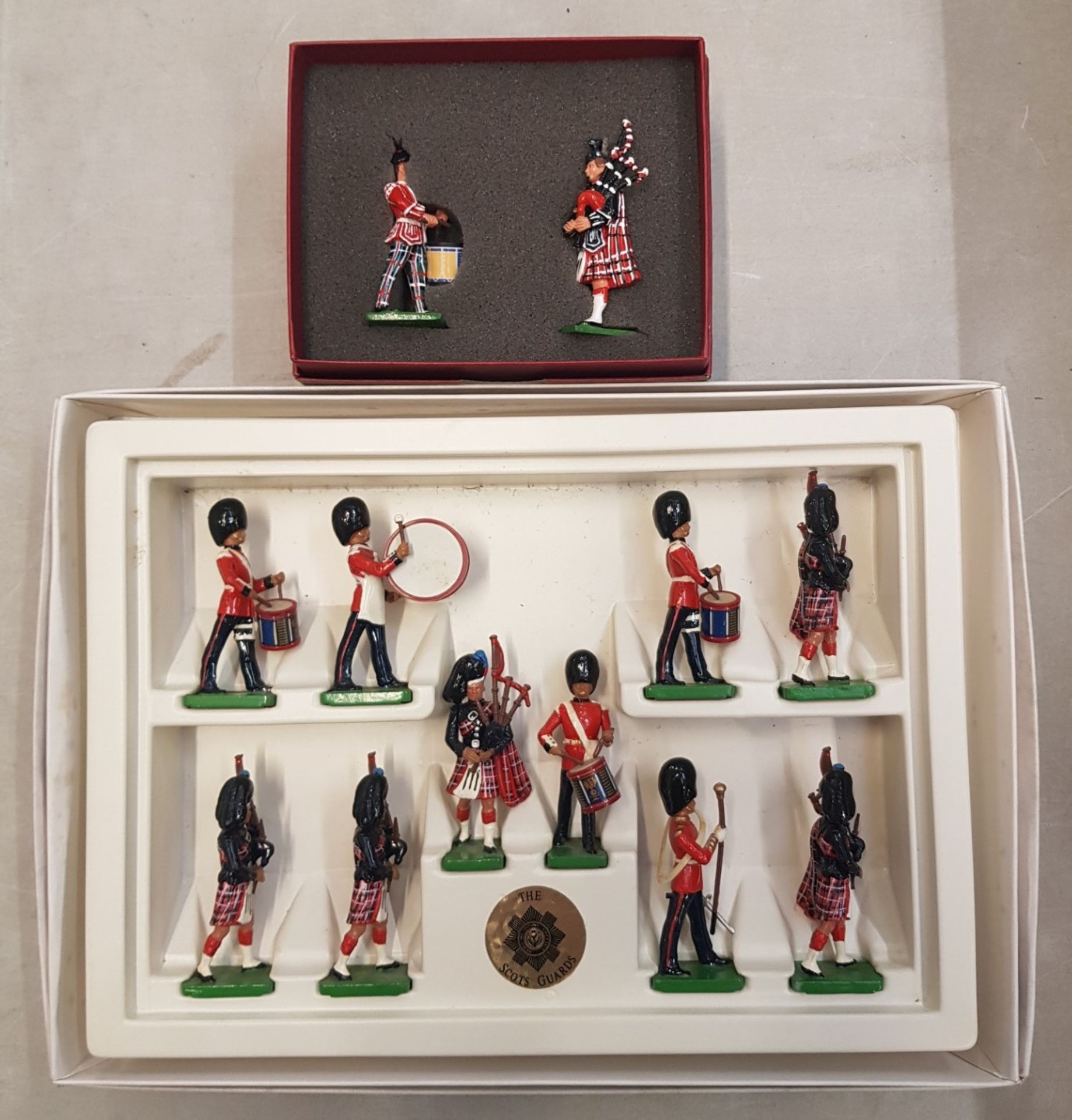 Boxed W Britain Scots Guards 10 Piece Band together with Two Special Collectors Edition KOSB Pipe