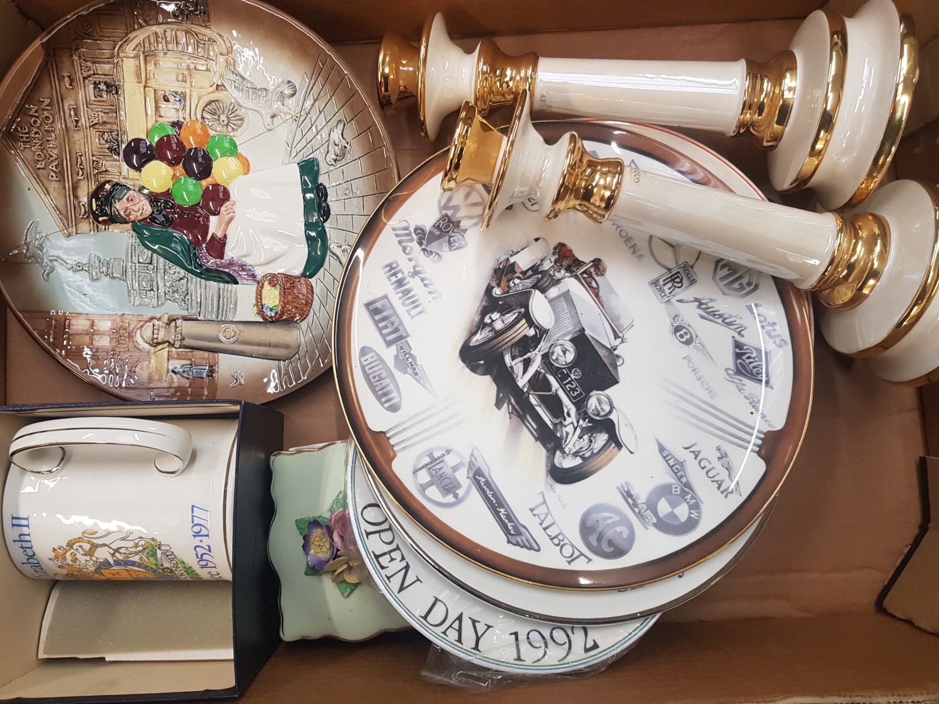 A mixed collection of items to include decorative wall plates, Royal Commemorative tankard,