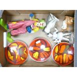 A mixed collection of items to include three Poole pottery pin dishes, Goebel Happy Clown, Beswick