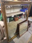 Very large gilt framed and bevelled edged wall mirror together with a mid-century teak framed wall