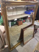 Very large gilt framed and bevelled edged wall mirror together with a mid-century teak framed wall