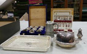 A collection of metal ware including some silver plated items to include lidded serving tray, spoons