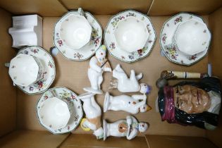 A collection of Royal Doulton Snowman figures, character jug, cups and saucers etc