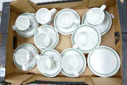 A collection of Portmeirion Botanic patterned items including coffee mugs saucers
