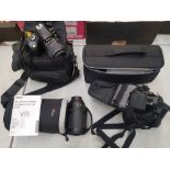 A collection of photographic equipment to include a Nikon D40x camera, Nikon AF-S VR 70 - 300mm