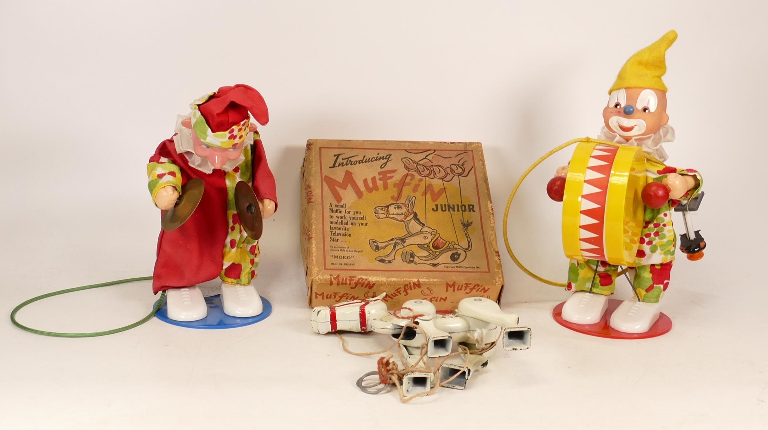 A Boxed Muffin the Mule Junior Puppet Toy together with two other Clown Musician Toys. (3)