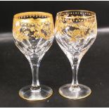 Two De Lamerie Fine Bone China heavily gilded Non Matching Wine Glasses, specially made high end