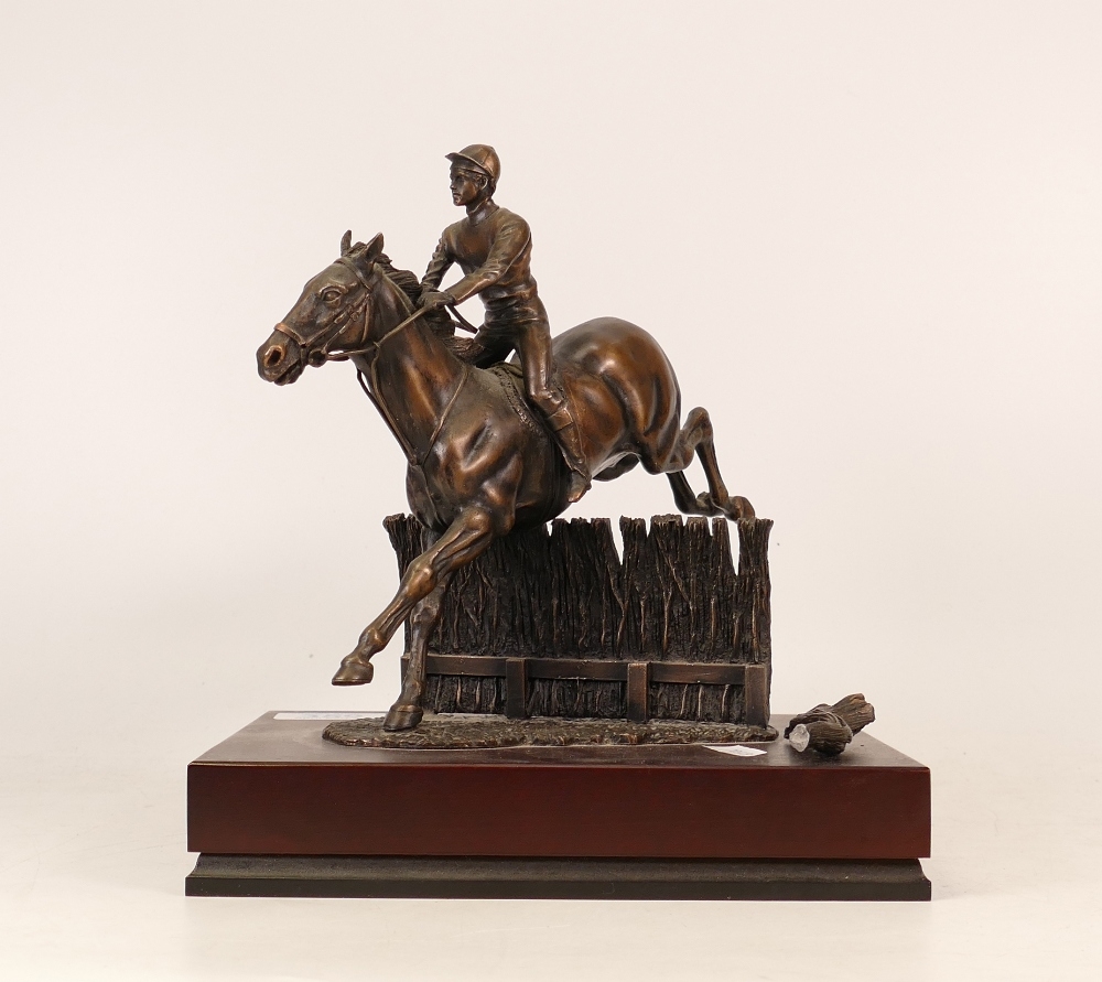 R Cameron bronze figure of racehorse jumping fence (tail a/f)