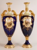 19th century Coalport pair of two handled vases, gilded all over & decorated with panels of