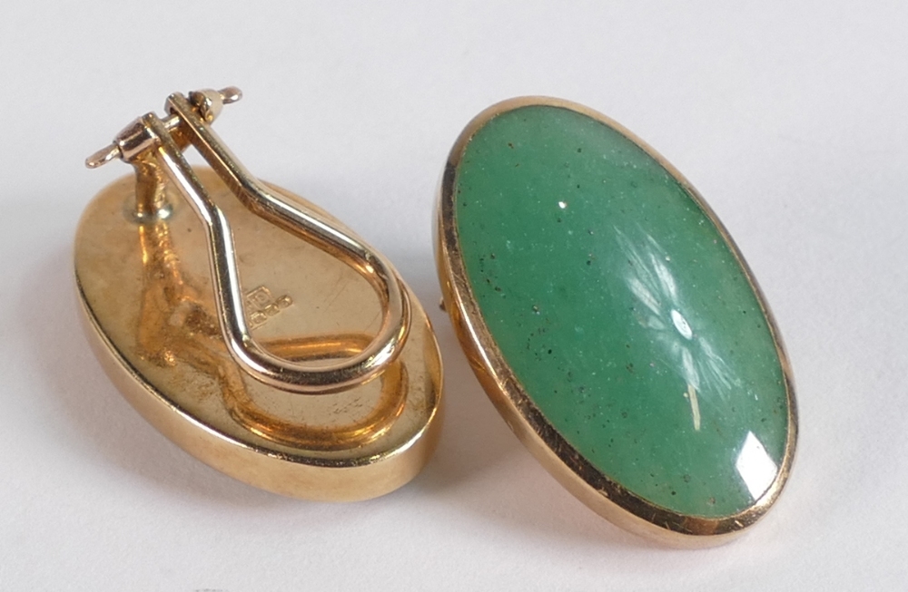 Pair 9ct gold gold earrings each set with oval green possible Jade stones, 7.7g. - Image 3 of 3