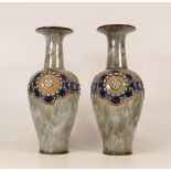 A pair of Royal Doulton Lambeth stoneware vases floral decorated . Height 22.5cm (2)
