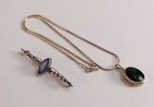 Silver stone set locket and chain and Silver brooch with dark blue Wedgwood jasperware insert. (2)