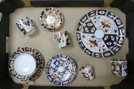 A collection of Royal Crown Derby pattern 2451 to include twin handled soup dish & saucer, small