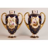 19th century Coalport pair of two handled vases, gilded all over & decorated with panels of flowers,