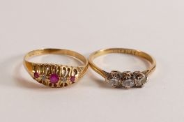 18ct gold & platinum three stone diamond ring, size O and another 18ct ring set with rubies,size
