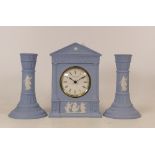 Wedgwood dancing hours mantle clock and matching candlesticks. Limited edition with certificates.